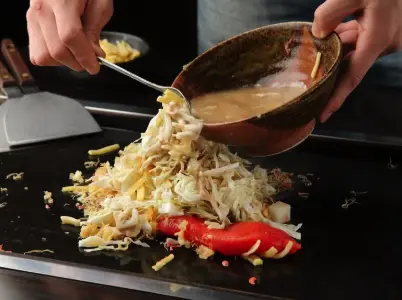Panduan Lengkap Wisata Kuliner ke Tsukishima: Jalan Monjayaki yang Ikonik di Tokyo 2026
